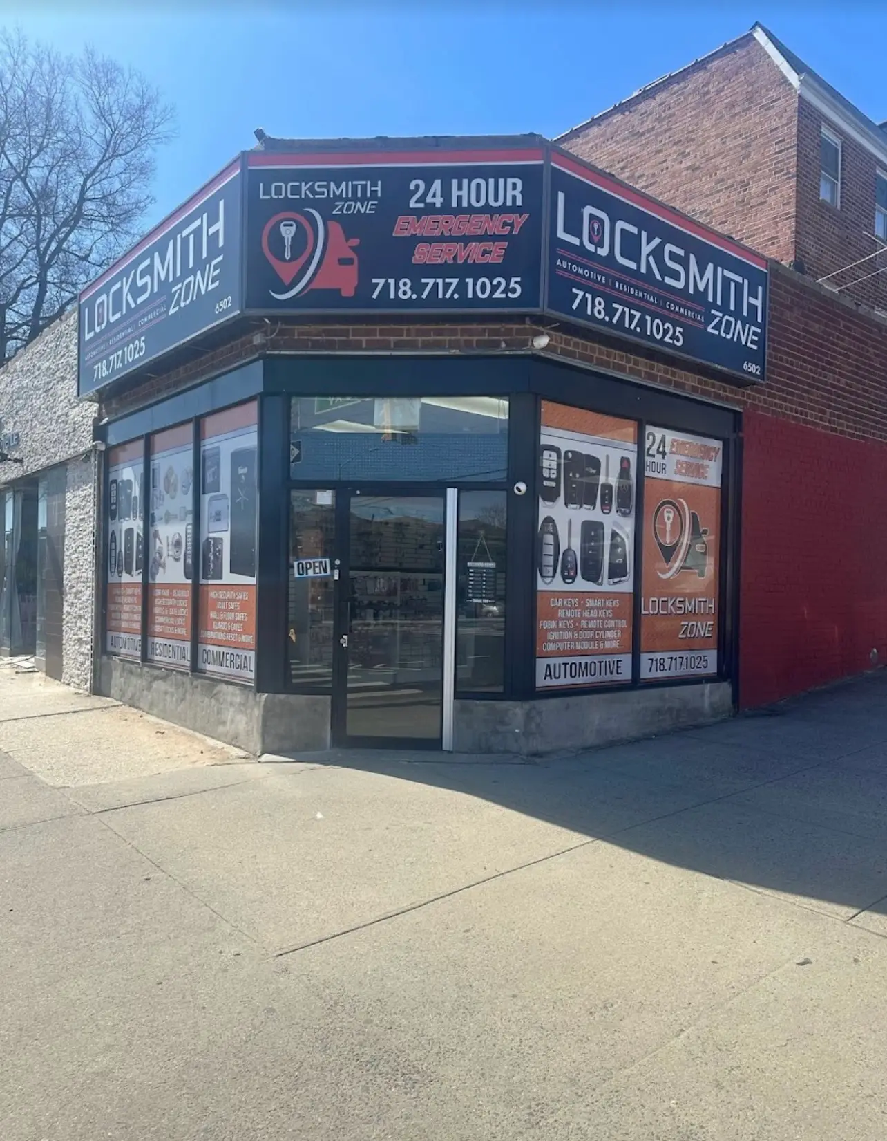 Locksmith Zone storefront at 65-02 164th Street, Fresh Meadows, Queens, with phone number signage